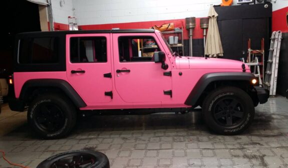 Pink Jeep wrapped with vinyl car wrap in Houston Texas